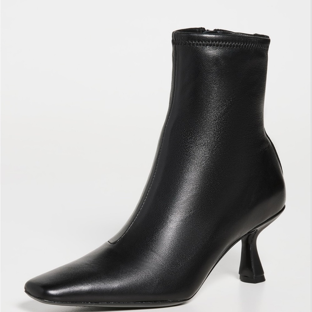 Loeffler Randall “Thandy” curved heel ankle boots. Black leather